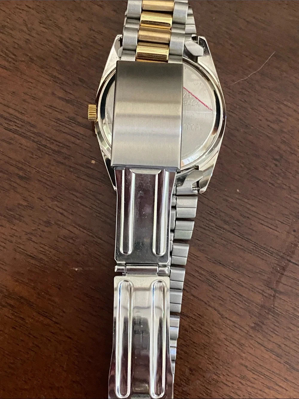 Landstrom’s Black Gold Watch with Blue Dial and Eagle Motif two tone band